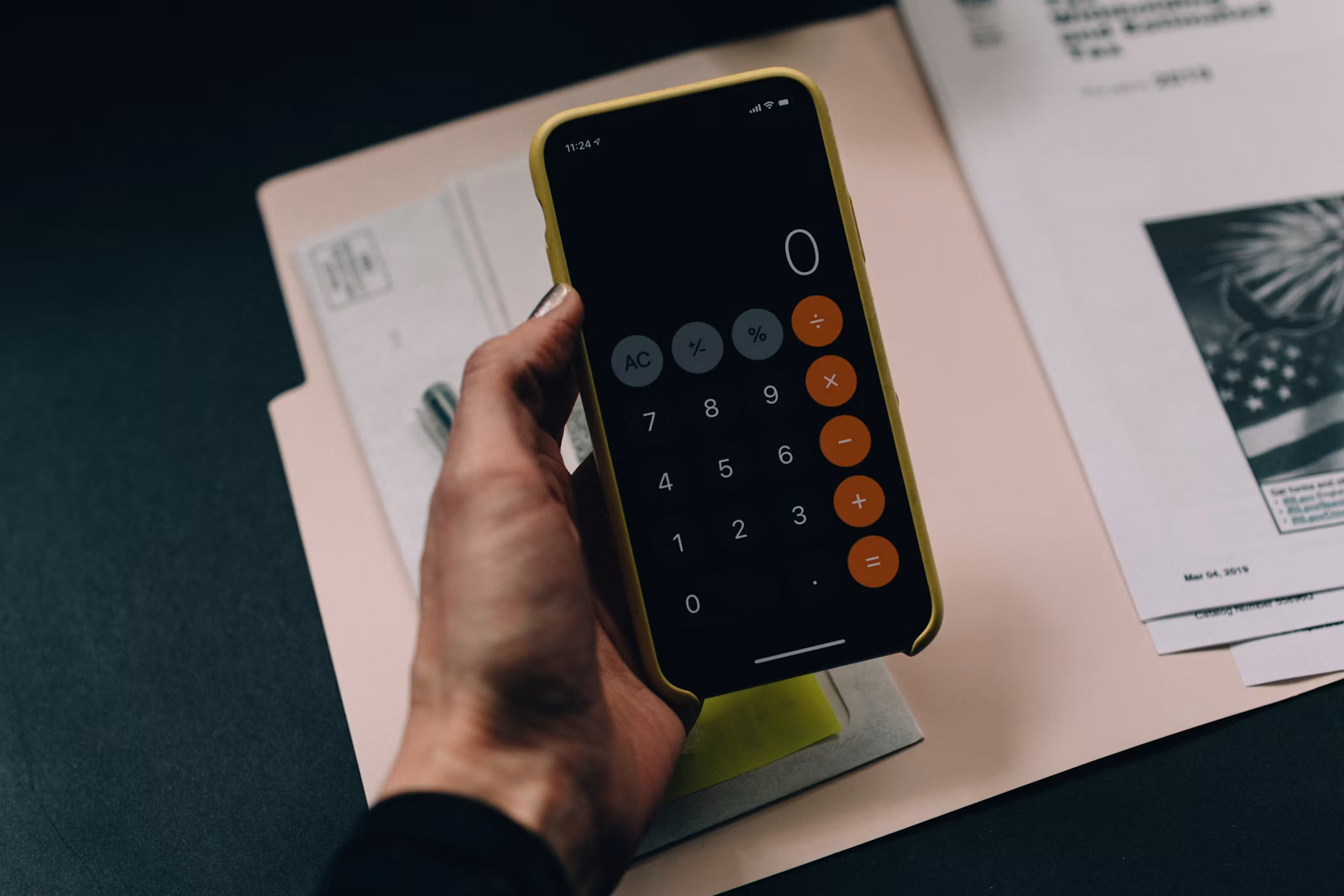 Reviewing bank statements and mail using a phone calculator
