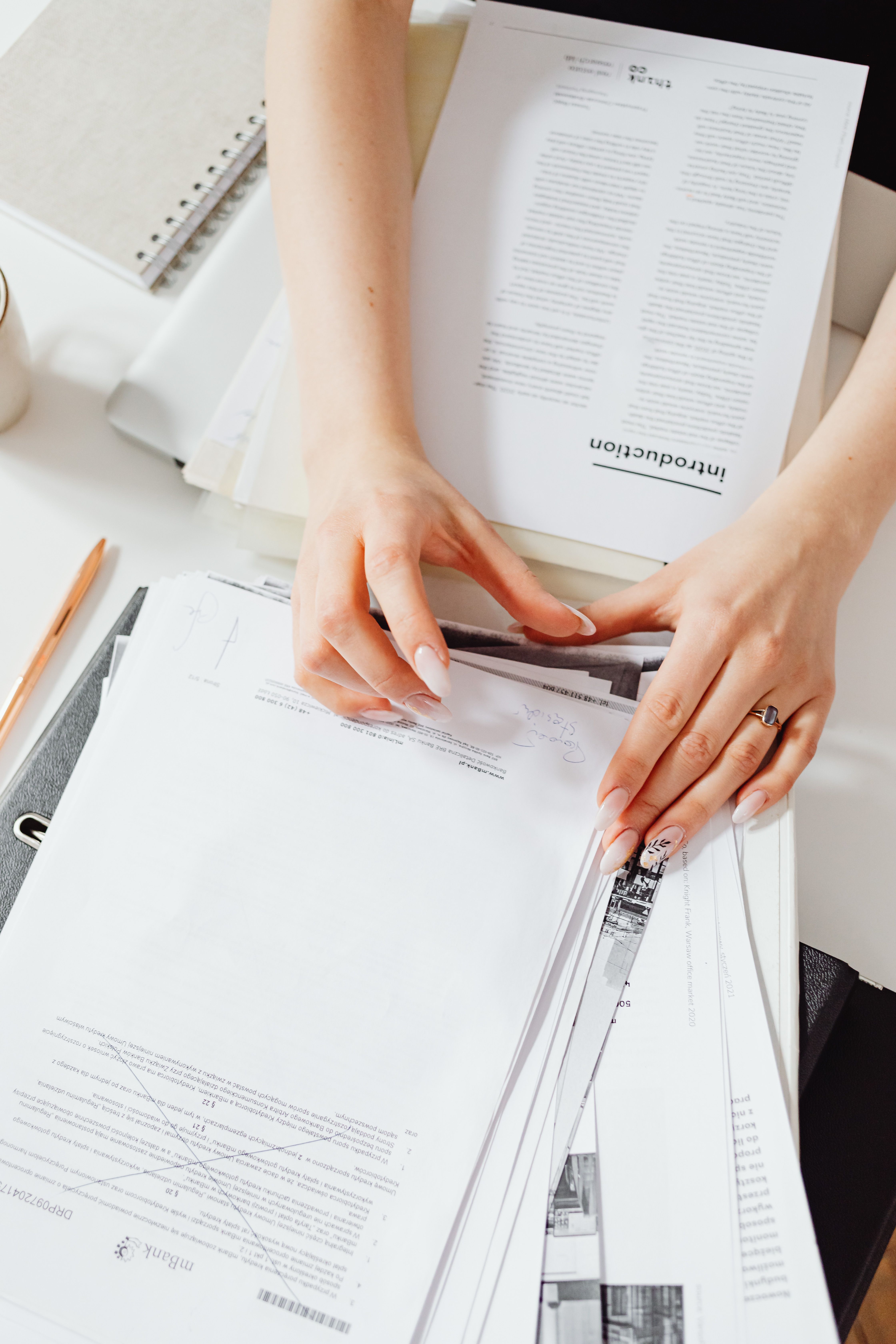 Sorting through a client's paperwork and bank records